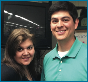 A man and woman pose for a picture.